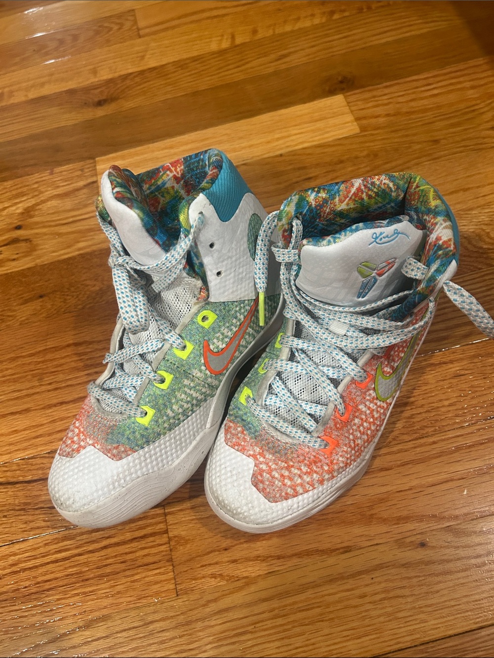 Nike Kids Multicolor High-Top Sneakers with Orange & Teal Accents